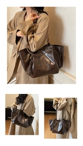 Close-up of vintage dark brown tote bag with retro leather texture and knot decoration
