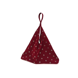 Retro burgundy velvet tote bag with hollow gold rivet accents and unique triangle shape