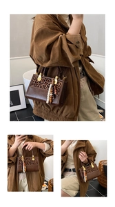 Detail of leopard print crossbody bag with woven handle and bohemian bead charm accent