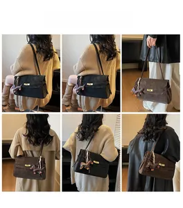 Detail shots of vintage tote bags in black and coffee brown with cute dog charms