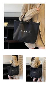 Three-angle lifestyle view showing the large capacity black canvas tote bag with lettering
