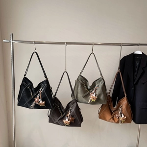 Four vintage tote bags in black, coffee, green, and tan with white contrast stitching