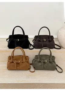 Selection of retro matte leather handbags in black, brown, camel and army green colors