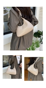 Three-way view of a minimalist cream half-moon underarm bag shown in versatile styling modes