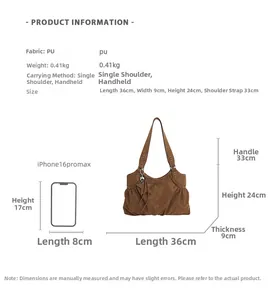 Brown vintage suede tote bag dimensions 36x9x24cm shown with phone for scale comparison