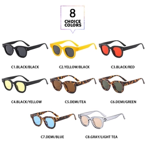 Détail de lunettes de soleil rondes rétro en huit couleurs avec rivets métalliques