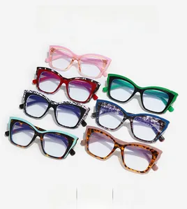 Flat lay of multiple stylish square anti-blue light glasses frames in assorted colors