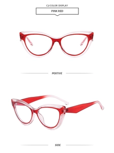 Detail view of pink and red cat-eye glasses frame with dual-layer transparent acetate design
