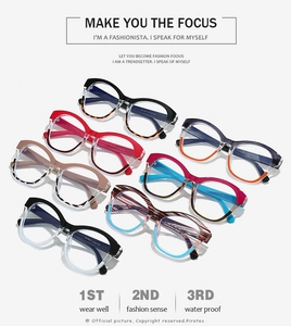 Flat lay of retro cat-eye glasses frames in multiple colorways including tortoiseshell