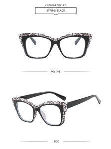 Detail view of square cat-eye glasses frame with C2 stripes and black finish