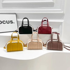 Plush-trimmed bowling handbags in five retro colors for winter commute and crossbody wear