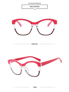 Detail of classic cat eye glasses frame with red, clear, and brown color-blocking design
