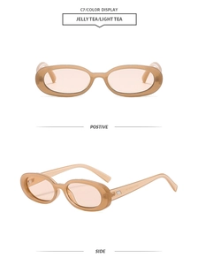 Detail view of jelly tea oval sunglasses showing front and side metal hinge frames