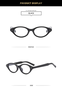Front and side views of vintage black oval glasses with polished frames and metal hinges