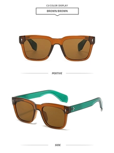 Detail of retro square sunglasses with amber frames and mint green transparent temples