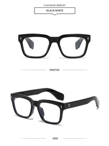 Detail view of square black frames showing silver diamond rivets on hinges and temples