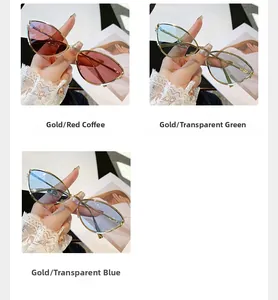 Détail de lunettes de soleil œil de chat dorées avec verres café rouge, verts et bleus