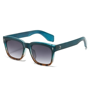 Classic square sunglasses with blue to tortoiseshell gradient frame and silver rivets