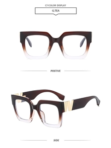Detail view of square gradient tea eyeglasses frame with golden metal W logo hinge