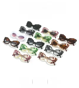 Detailed display of 12 stylish cat-eye sunglasses variants with unique wave frame design
