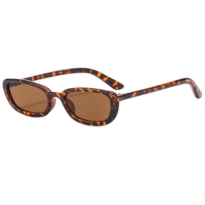 Classic retro tortoiseshell oval sunglasses with dark brown lenses for outdoor street style