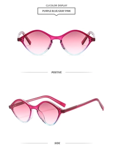 Detail view showing cat-eye frame and gradient purple-blue lenses of the sunglasses