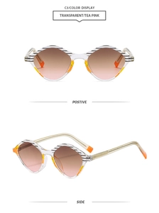 Detail of geometric rhombus sunglasses with transparent frames and orange nose pads