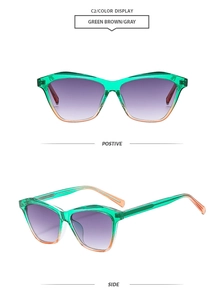 Detail view of green geometric sunglasses with purple gradient lenses and orange tips