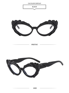 Front and side views of black cat-eye sunglasses with unique flame-shaped sculpted frames
