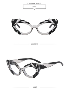 Cat eye sunglasses with gray frame and black wing detail, front and side views