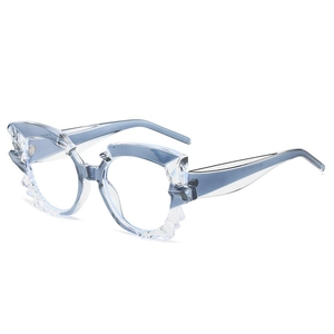 Modern light blue transparent polygonal cat-eye sunglasses with geometric cut frames