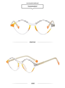 Detail view of transparent orange geometric sunglasses with black and white stripes