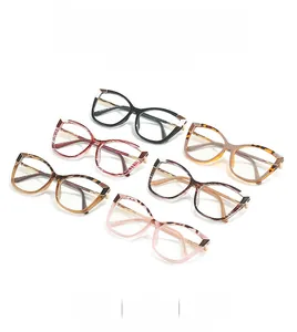Detail view of multi-color cat eye glasses frames with metal accents and size specs