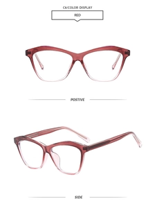 Deep red transparent cat-eye sunglasses with visible metal core and pink temple tips