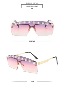 Detail of rimless rim-cut sunglasses with pearl accents and purple gradient lenses