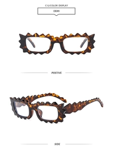 Detail view of demi brown irregular wavy frame sunglasses with UV protection and unique texture