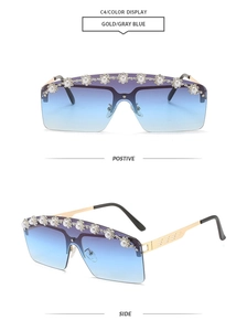 Detail of rimless pearl sunglasses with blue gradient lenses and gold metal frames