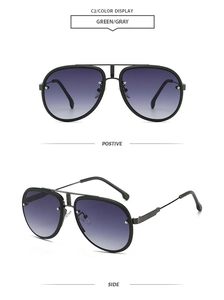 Macro detail of matte black aviator sunglasses with gradient lenses and striped temple joints