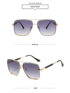 Detail view of gold metal aviator frames with purple gradient lenses and black temple tips