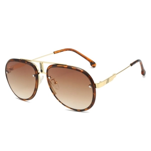 Retro pilot sunglasses with tortoise shell frames and brown gradient lenses in gold metal