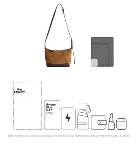 Detail showing internal capacity of the brown leopard baguette bag with daily essentials