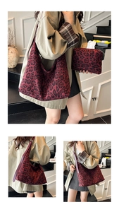 Detail of red leopard print tote bag and matching pouch with premium leather straps