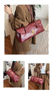 Detail view of burgundy retro leather shoulder bag featuring a golden U-shaped lock buckle