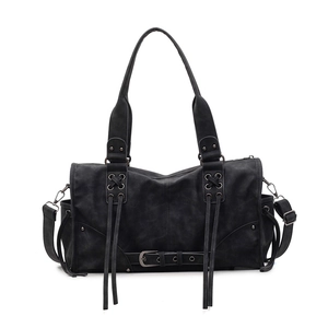 Vintage black moto tote bag with fringe tassels and crossbody strap in matte leather finish