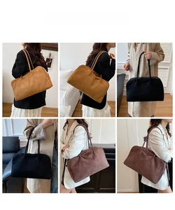 Detailed views of high-capacity suede tote bags in brown, black, and coffee for women