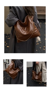 Close-up of brown quilted tote bag with diamond lattice pattern and gold chain strap