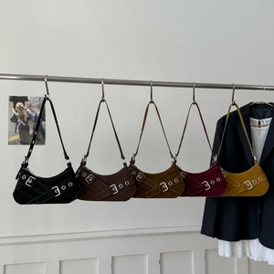 Suede crescent underarm bags in five colors with vintage buckle and metal eyelet details