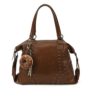 Brown leather tote bag with stylish rivets, large capacity, and donut charm detail