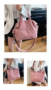 Detailed view of pink corduroy tote bag with TOTE BAG embroidery and adjustable strap