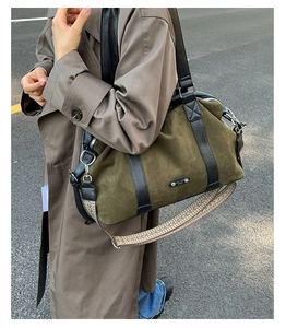 Detail of army green frosted tote bag featuring patterned ethnic style shoulder strap